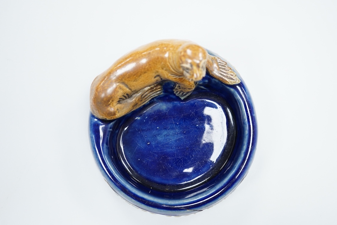 A Doulton ‘silver seal port’ advertising ashtray, 13cm wide (a.f)
